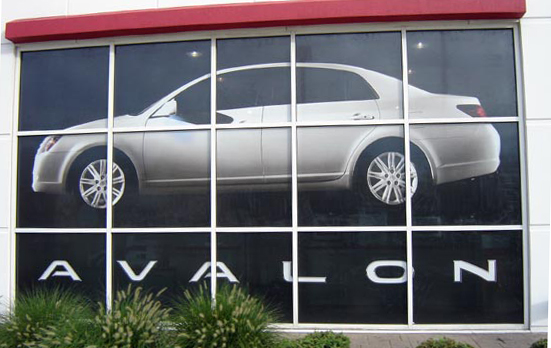 picture of storefront window business see through graphics