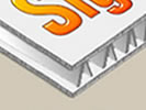 Picture that demonstrates what the layers of the alumalite sign material look like