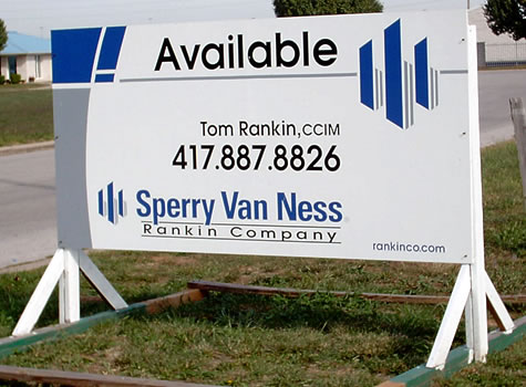 picture of a large real estate yard sign