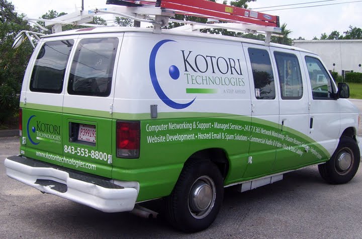 picture of a commercial van with vinyl lettering and graphics